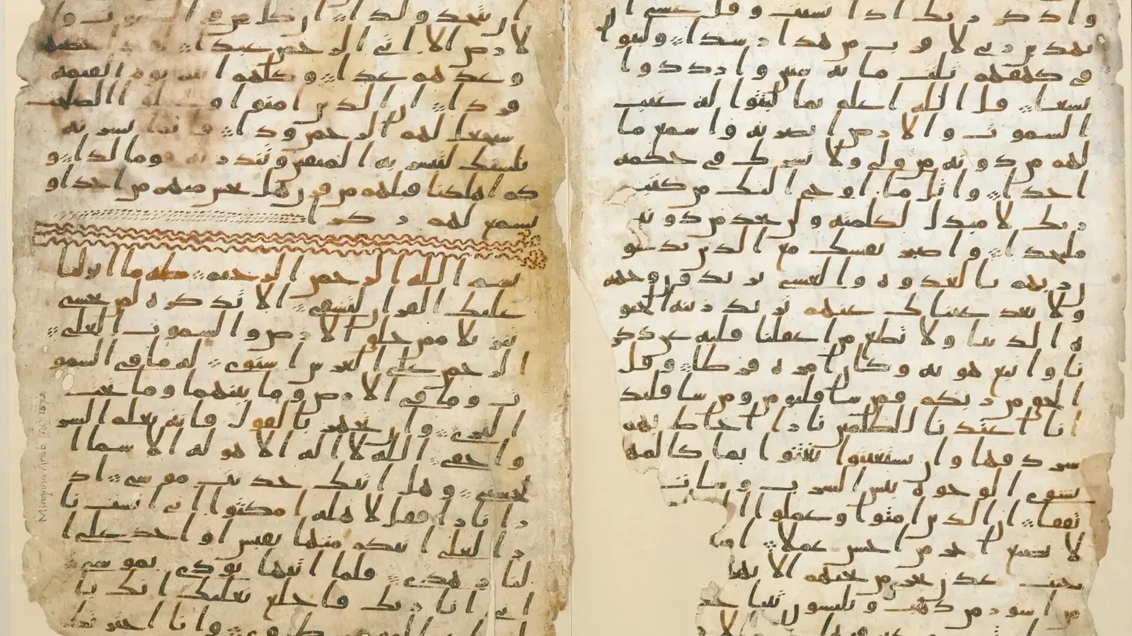 Two parchment pages of the Birmingham Qur'an manuscript, written in early Arabic script