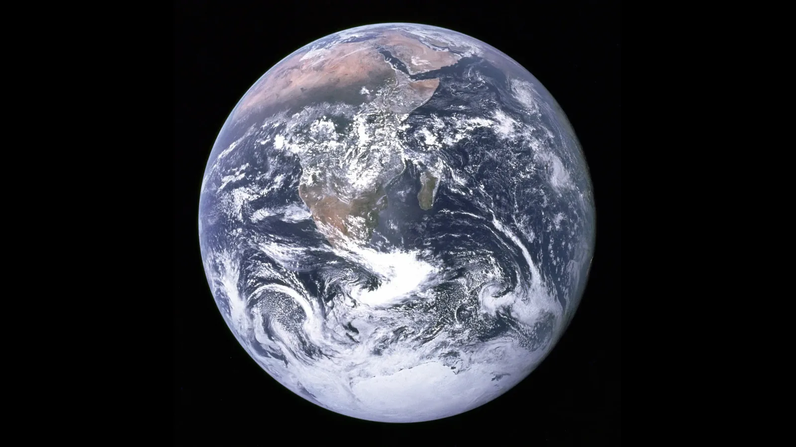 The whole Earth seen from space: Africa, Arabia and Antarctica under swirling cloud